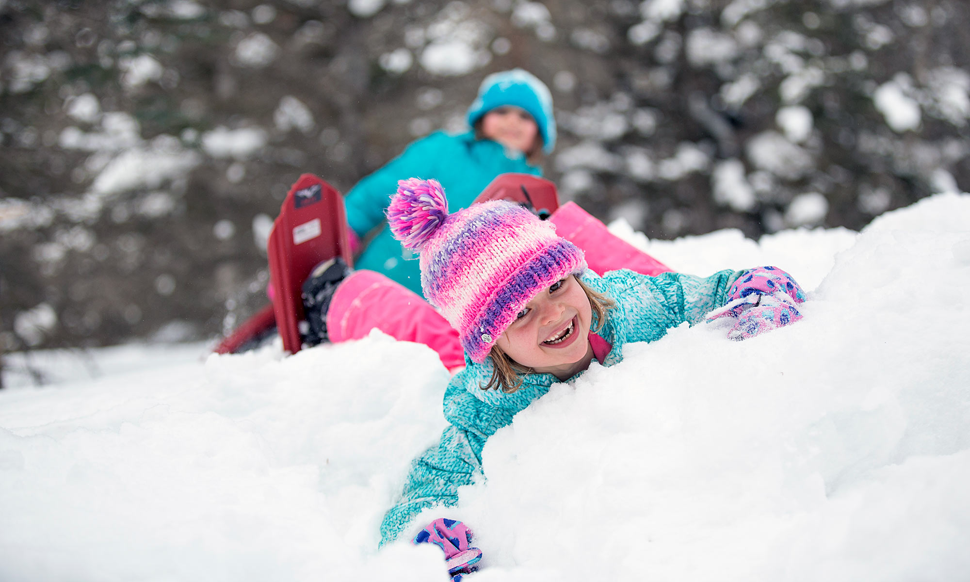 kids playing in the snow